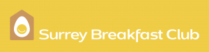 The Surrey Breakfast Club logo has white text on a mustard yellow background. Beside the words is a house with an egg inside. The text is all on one line.