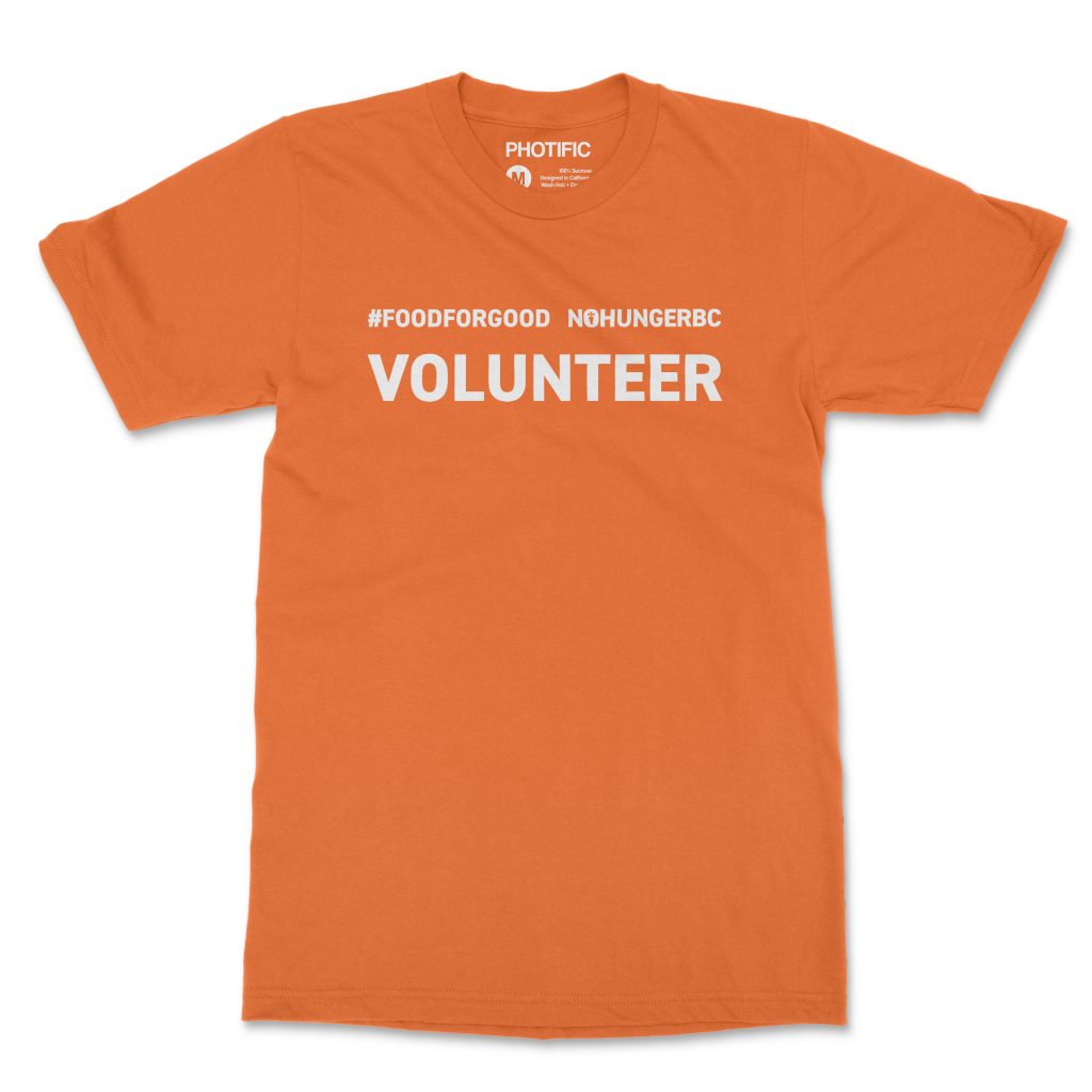 An orange t-shirt that has "Volunteer" written on the front.