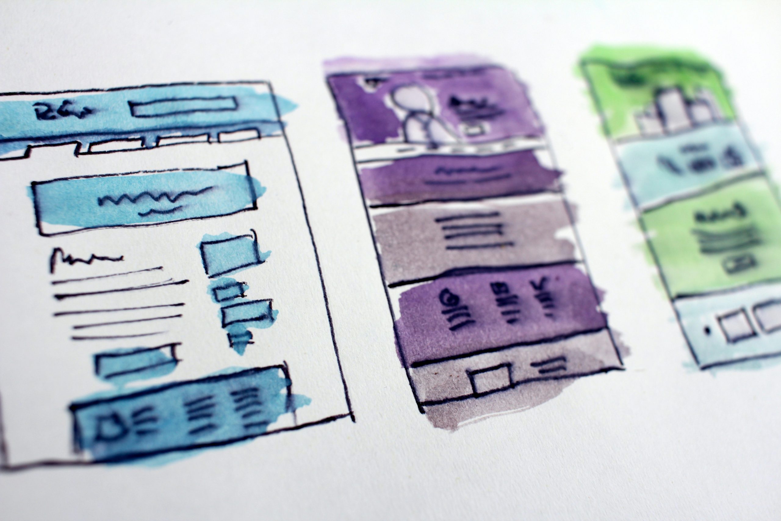 Image of water colour wireframes on paper