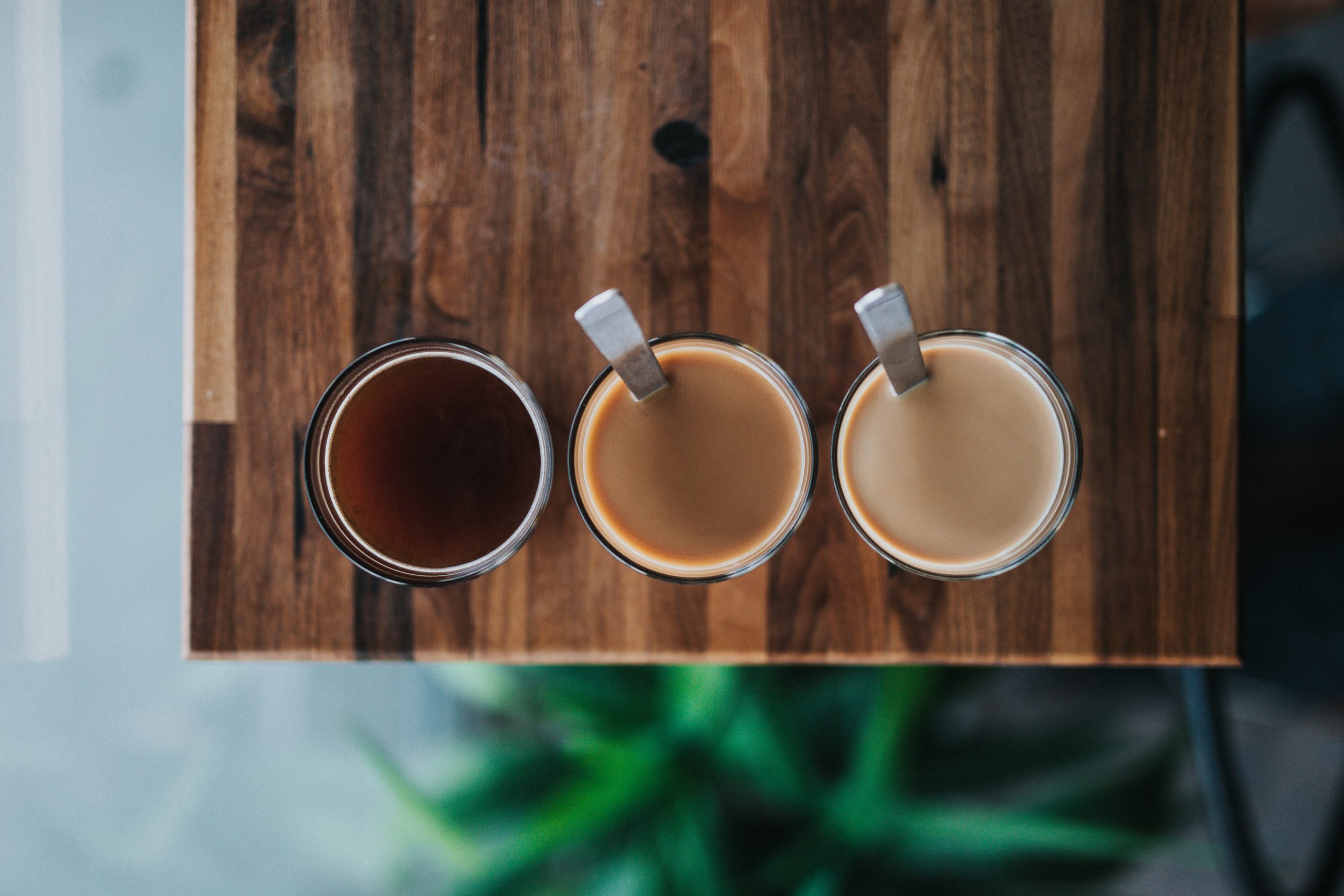 Three different types of coffee: black, light cream, heavy cream.