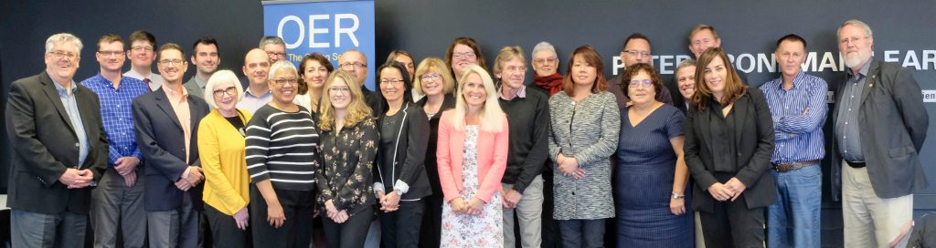 Attendees of the 2017 OERu Partners meeting standing together.