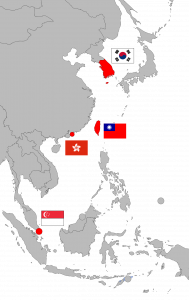 A map with the four Asian Tigers/Dragons are seen here with their respective flags. The four Asian Tigers are (from North to South): South Korea, Taiwan, Hong Kong and Singapore. In the second half of the 20th century, they underwent rapid industrialization and maintained exceptionally high growth rates and have developed into high-income economies.