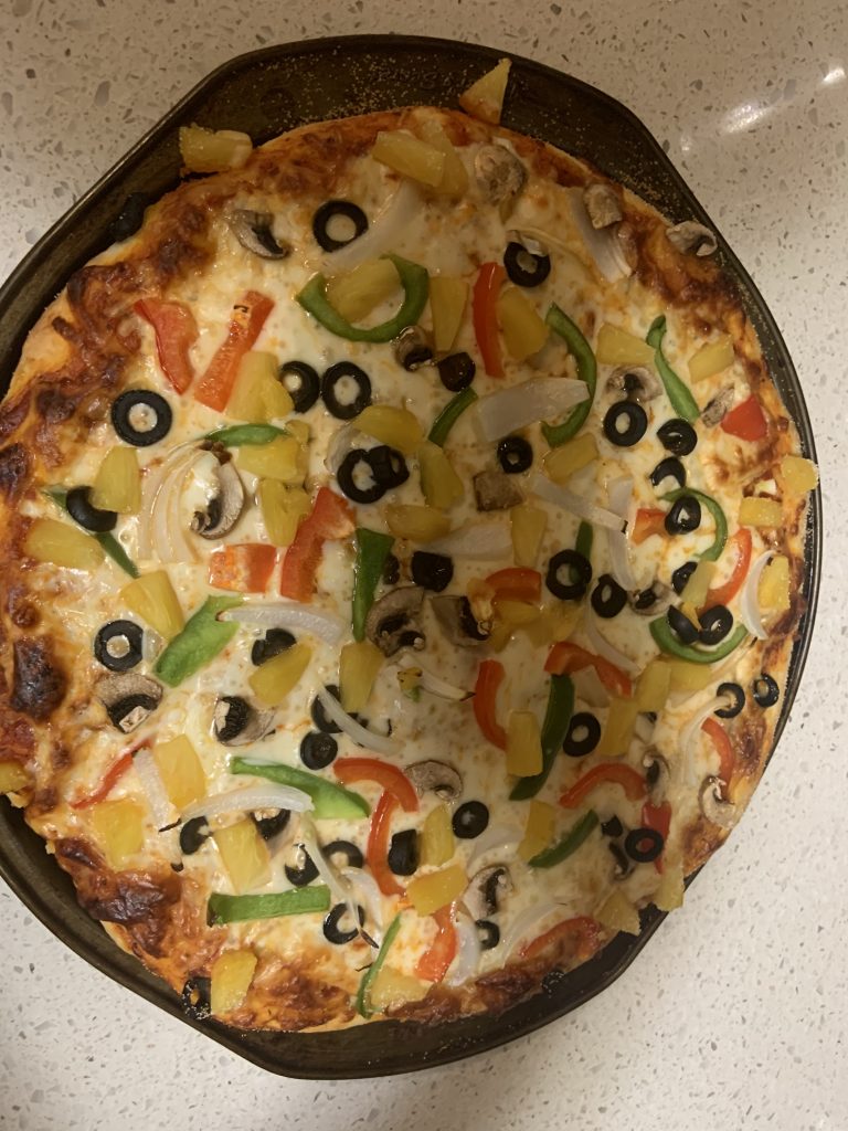 A baked homemade pizza.