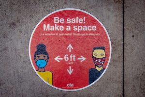 Image of a public notice that reads "Be safe! Make a space" and emphasizing the need to be 6 feet apart from other people.