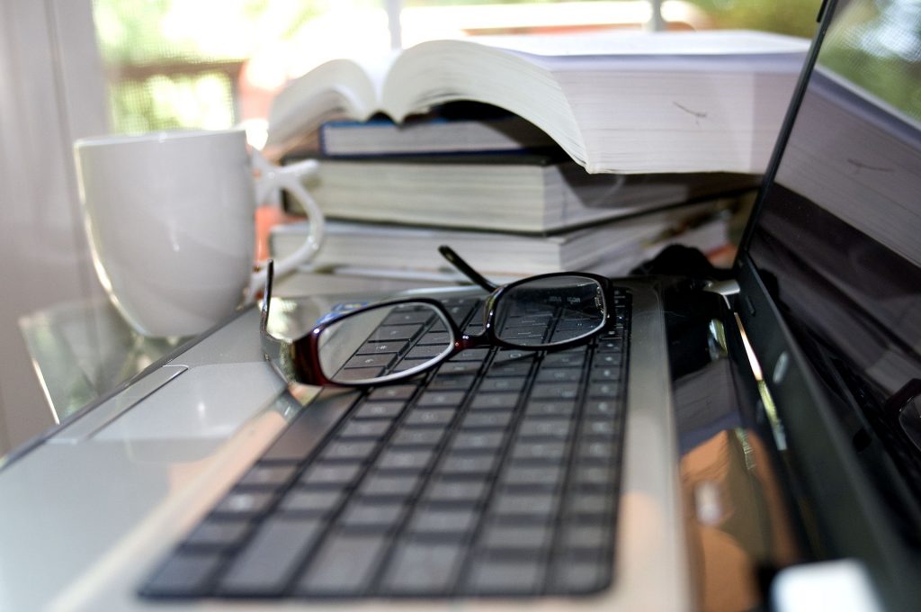 Image showing books and a laptop