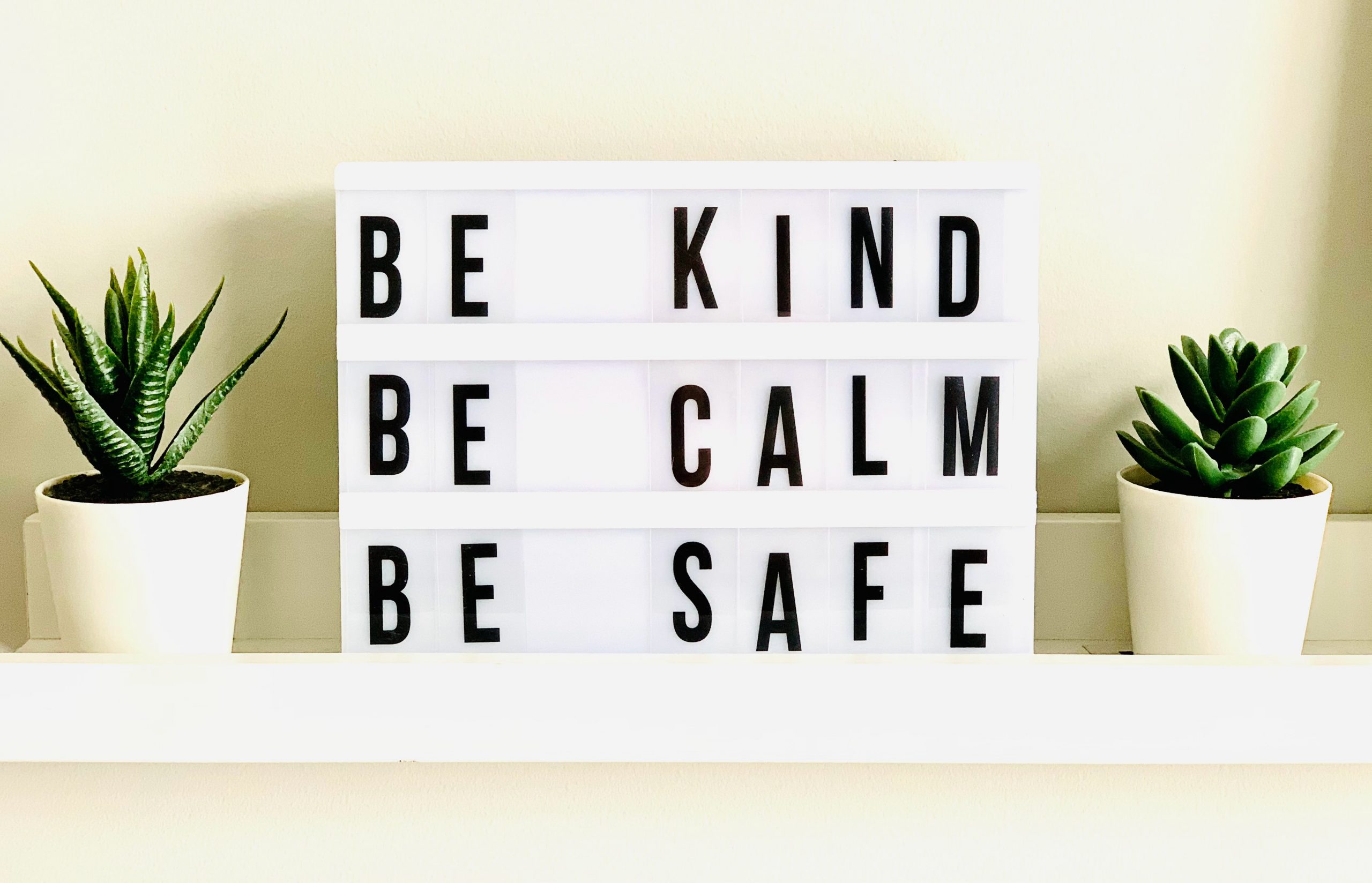 Sign that reads Be Kind Be Calm Be Safe