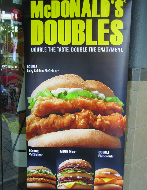 McDonald's Doubles burger poster.