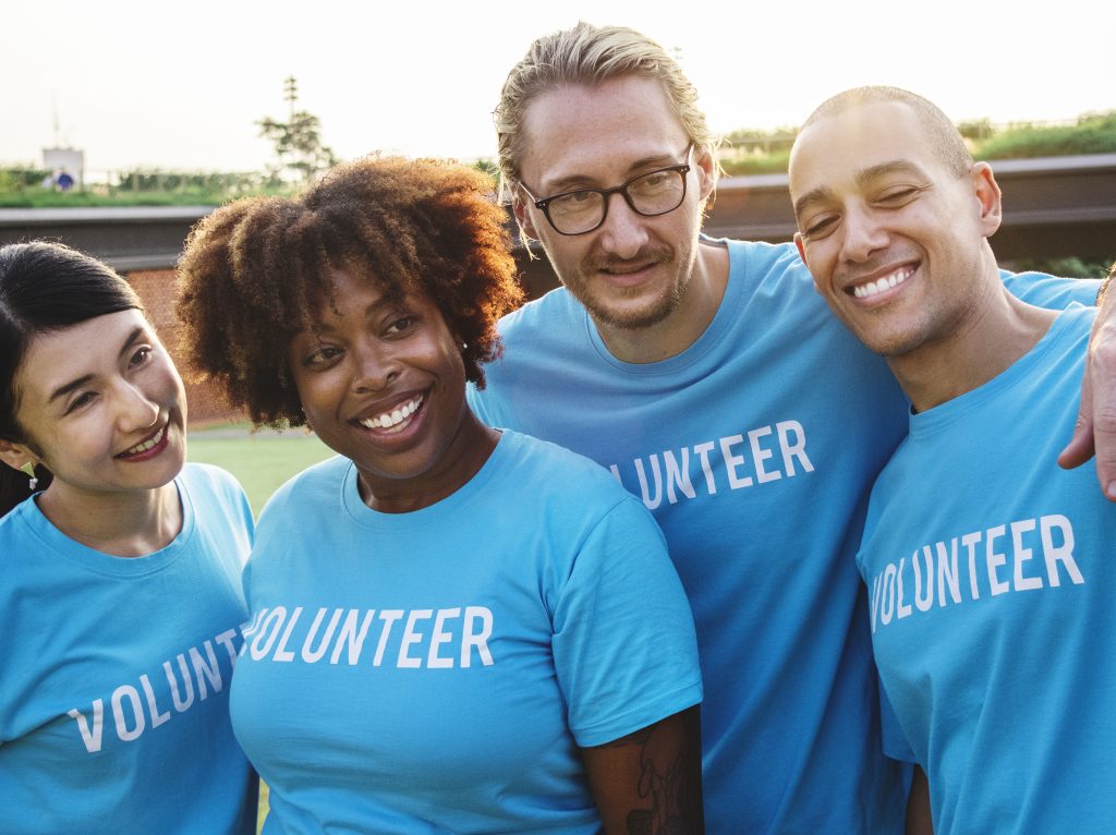 A picture of Group of happy and diverse volunteers