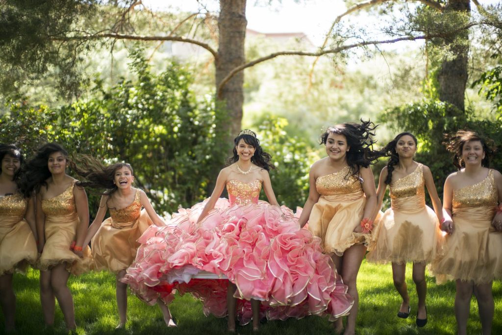 A photo of la quinceañera with her friends