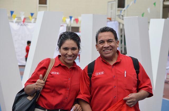 Two coworkers smiling together